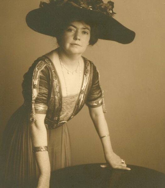 Catherine Hershey in a Floral Hat Facing Camera
