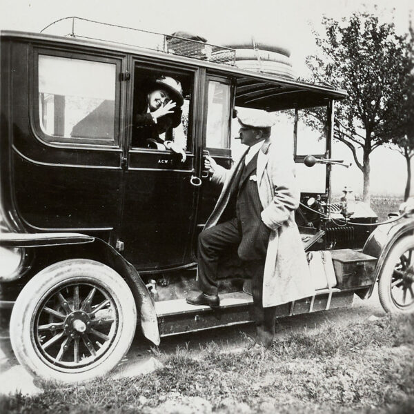 Milton standing outside a vehicle with Catherine Hershey inside